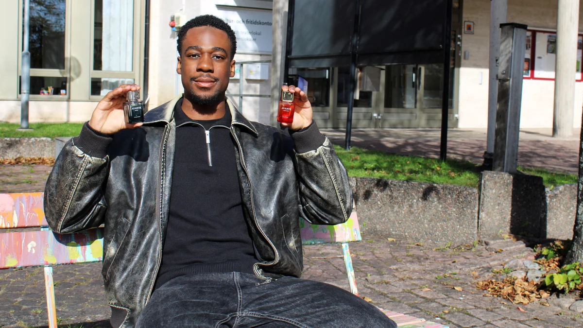 Avante founder holding the Lune D'Or and Blanc bottles